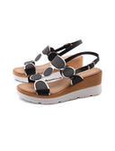 Sandalo con zeppa e plateau da donna
