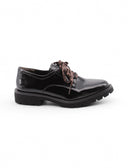 Stringata in vernice nera da donna