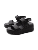 Sandalo nero in pelle con zeppa donna