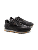 Sneaker in pelle effetto pitone donna