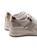 Sneaker vegana con zeppa da donna