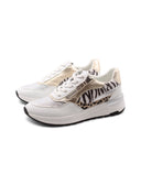 Sneaker vegana animalier con strass