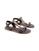 Sandalo in pelle con pietre e borchie