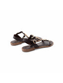 Sandalo in pelle con pietre e borchie