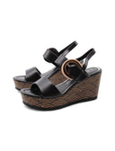 Sandalo nero con zeppa e plateau donna