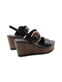 Sandalo nero con zeppa e plateau donna