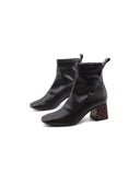 Tronchetto nero con tacco animalier