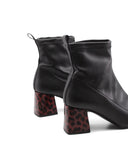 Tronchetto nero con tacco animalier