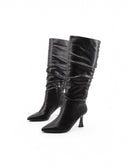 Stivale slouchy con tacco a rocchetto