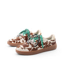 Rebel Sneaker muccata da donna