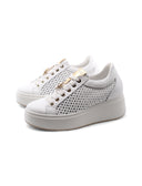 Sneaker gioiello con zeppa interna