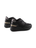 Sneaker zeppe slip on con glitter donna