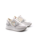 Sneaker da bimba con zeppa