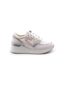 Sneaker da bimba con zeppa