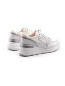 Sneaker da bimba con zeppa
