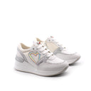 Sneaker da bimba con zeppa
