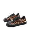 Kiki 01 sneaker animalier con morsetto
