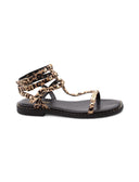 Coralie sandalo animalier con borchie
