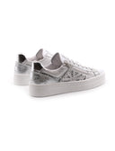 Sneaker donna in pelle laminata
