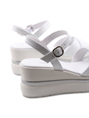 Sandalo con zeppa e plateau da donna