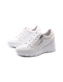 Sneaker zeppa in pelle con zip laterale