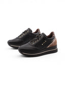 Sneaker zeppa in pelle da donna