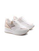 Sneaker zeppa con borchie da donna
