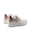 Sneaker zeppa con borchie da donna