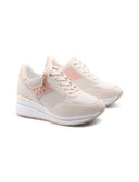 Sneaker zeppa con borchie da donna