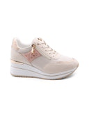 Sneaker zeppa con borchie da donna