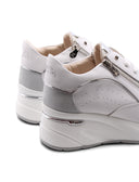 Sneaker bianca con zeppa da donna