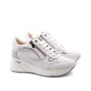 Sneaker bianca con zeppa da donna