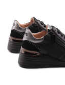 Sneaker nera con zeppa da donna