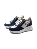 Sneaker zeppa con dettagli in suede