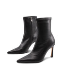 Tronchetto nero a punta con tacco alto