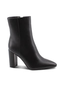 Tronchetto nero a punta con tacco alto