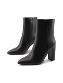 Tronchetto nero a punta con tacco alto