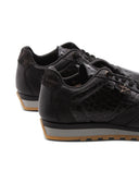 Sneaker in pelle effetto pitone donna
