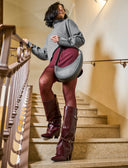 Stivale risvoltato con borchie da donna