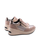 Sneaker zeppa con zip da donna