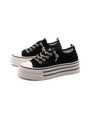 Sneaker platform con lacci gioiello